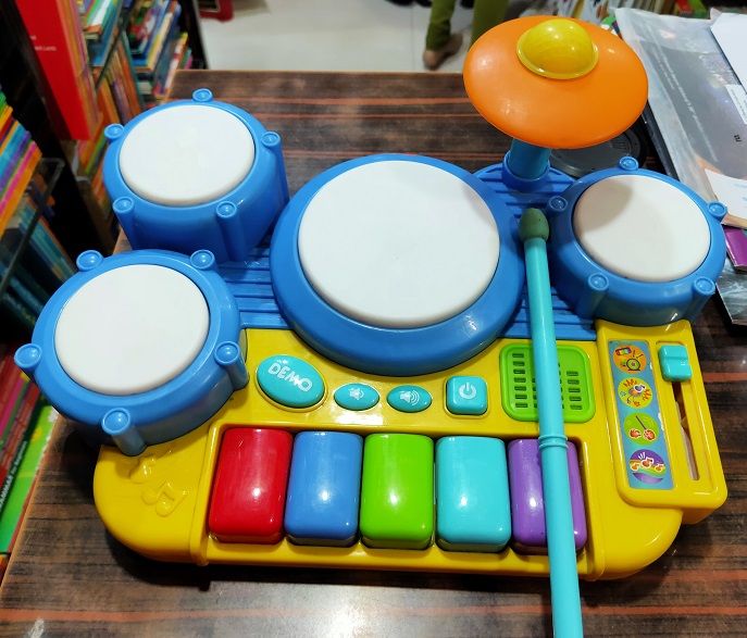 MUSICAL DRUM WITH PIANO